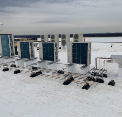 Ductless Splits installed on hospital roof.  The design engineer documented the refrigerant piping arrangement shown here (prior to insulation) to use for future project specifications/examples of “how they want it done”.